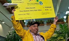 Quezada receiving his yellow lottery check