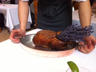 Honey lavender duck presented by the chef before carving it.