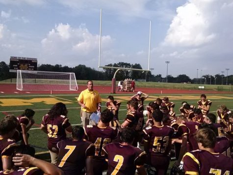 Coach Kubik talks to the football team after their win against Lenape Valley