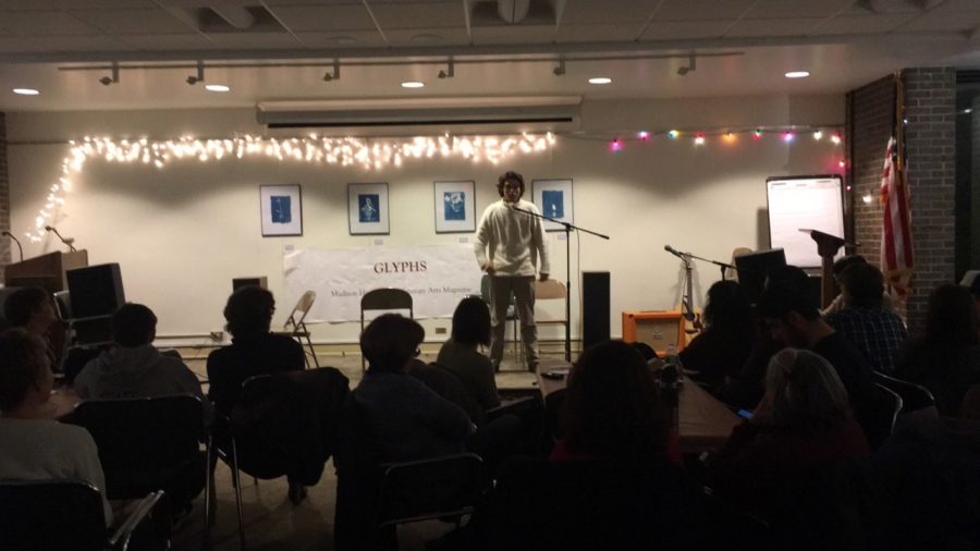 Senior Ransom Silliman reciting a poem at the coffeehouse.