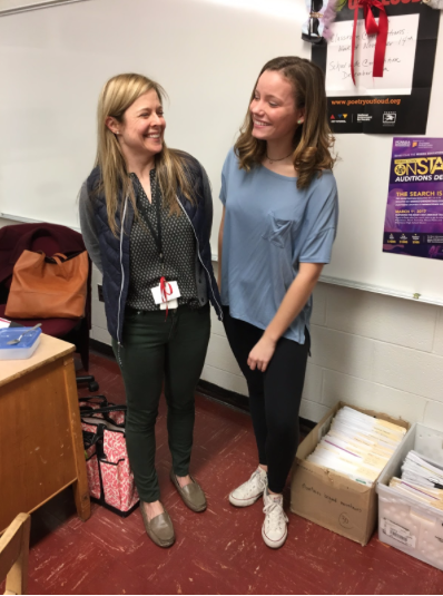 English teacher Kathleen Bergen, and junior Lydia Hendrickson share a smile together in the Honors English 11 class