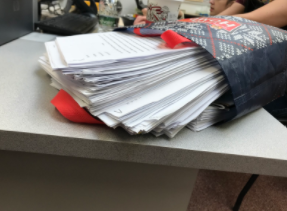 This mound of papers is just one small fraction of what Mrs. Bergen has to grade for one of her classes!