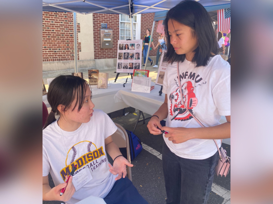 Madison High School junior and Madison Historical Society student volunteer Yanyan Li (left) explains the concept of a museum focus group to Madison High School junior Kate McElvanny (right) Photo Credits: Elise Hart