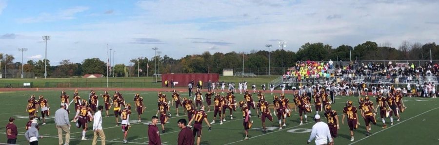 The Dodgers warm-up before playing the second half against Hanover Park on October 23rd.