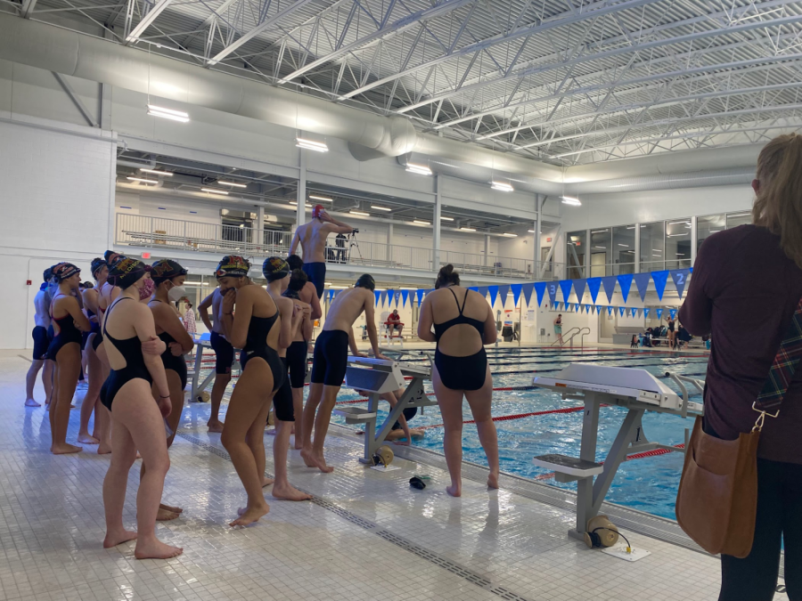 The Madison Dodgers warm up before their meet against Mendham on December 21st.