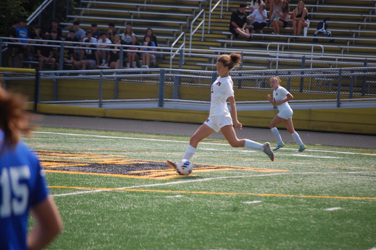 Anna Gominiack prepares to pass the ball downfield in the game against Hanover Park.