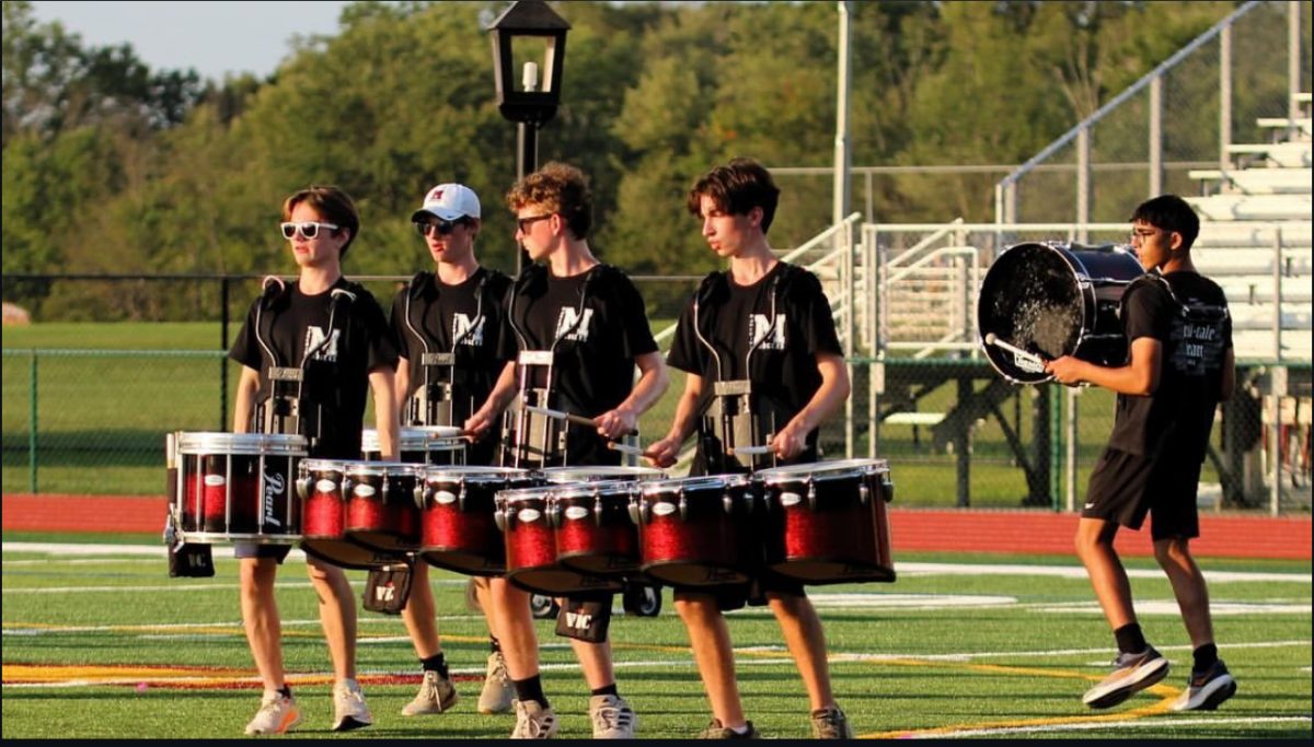 The Drumline preparing for the upcoming Marching band season over the summer, (Colin Johansen) Far left is the drumline captain for the Marching Dodgers