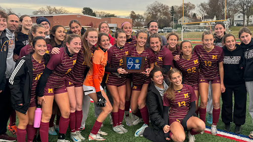 Madison Varsity Girls Soccer team posing after winning the North Jersey, Section 2, Group 2 Final at Ted Monica Field on November 14.